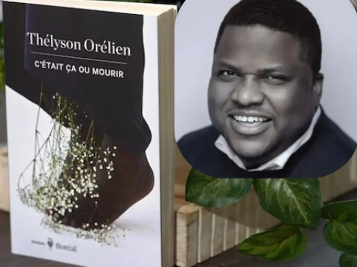 L'auteur Thélyson Orélien posant devant son livre